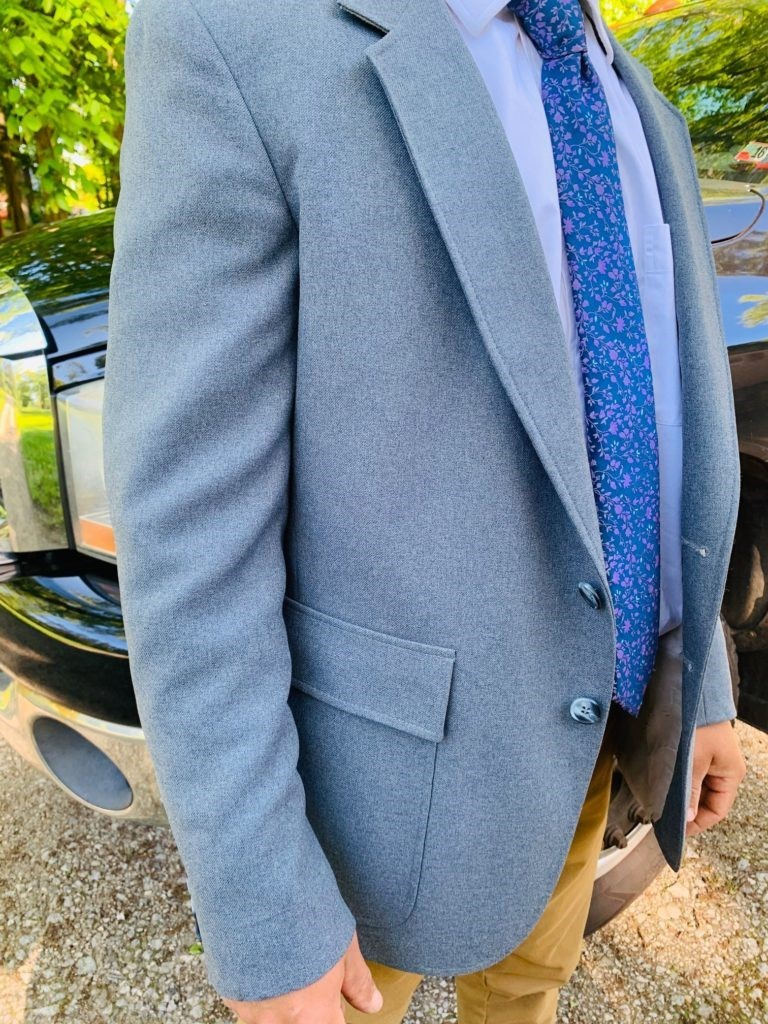 close up of suit worn by young man