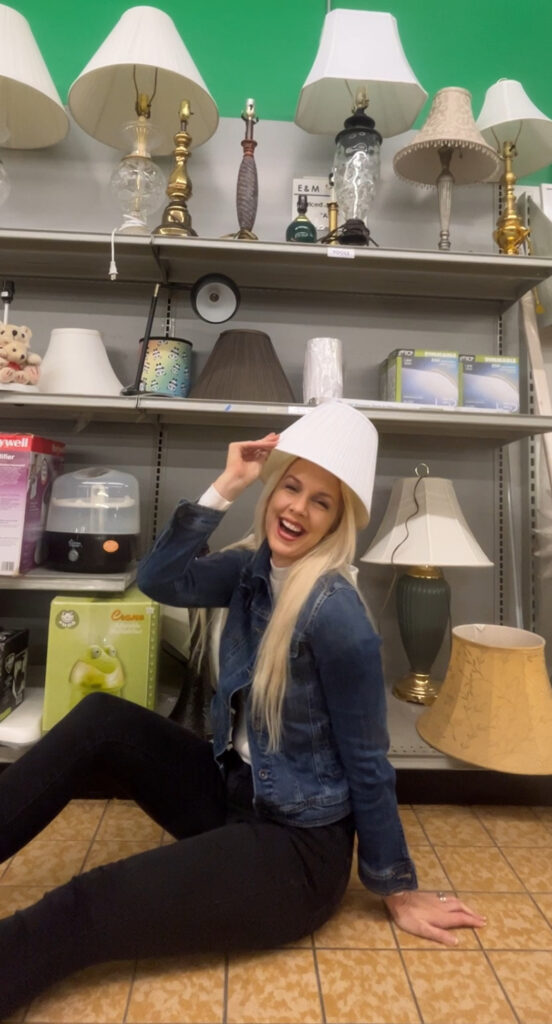 Julie Holiday looking at lamps at the Northfield Goodwill location.