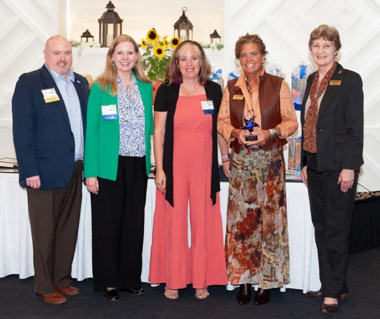 2025 "Making a Difference" Honoree Heather Hydel receiving her award